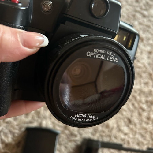 Sony camera like new with handle, flash, and bag