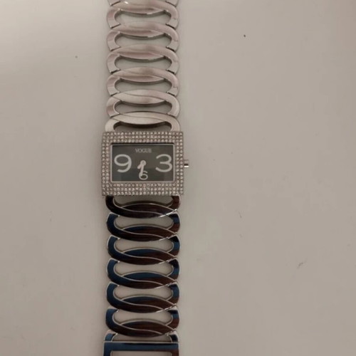 Vogue women's watch like new with rectangular case and crystals