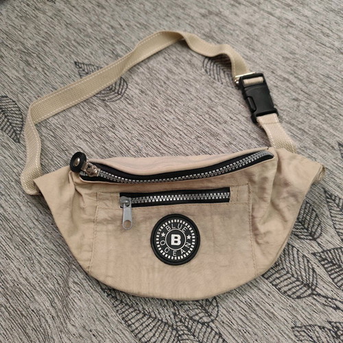 Beige waist bag like new with 3 compartments