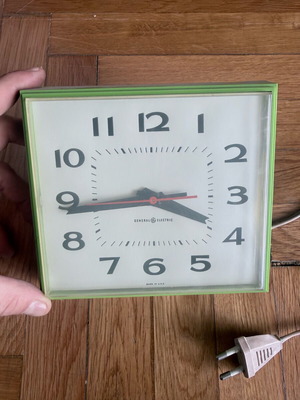 Vintage General Electric electric wall clock used, analog