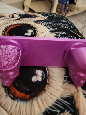 Wall hanger with skull design
