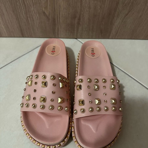 Keep Fred pink soft slippers like new with gold studs