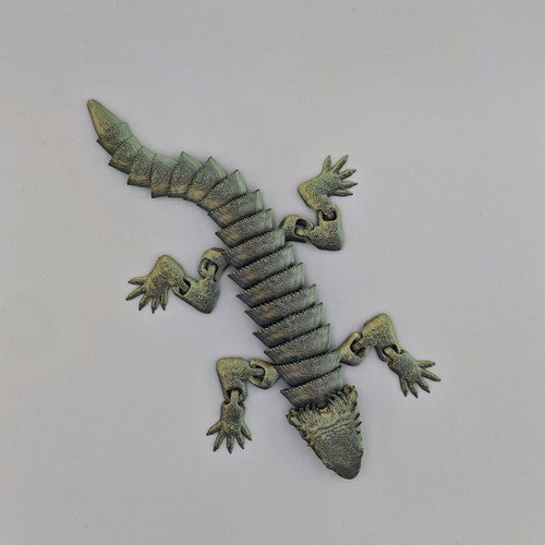 Articulated dragon new, 3d printed from esun pla silk magic material