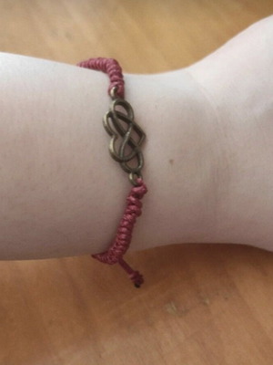 Handmade bracelet with red heart, like new
