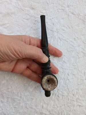 Handmade carved wooden pipe with stone inlay