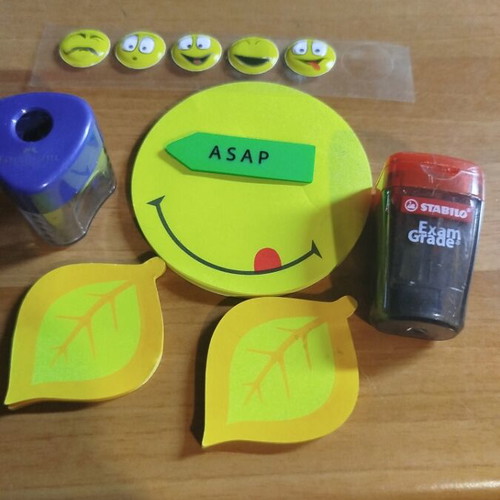 Post-it notes and 2 pencil sharpeners