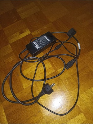 Authentic Asus laptop charger used, black