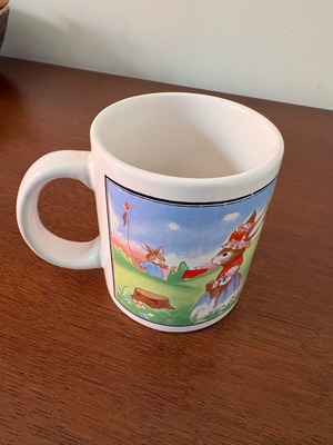 Vintage children's ceramic mug with Easter theme like new