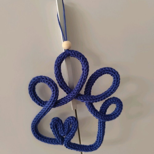Knitted decorative paw with heart new, handmade