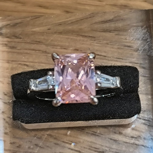 Ring with pink rectangular zircon and silver plating