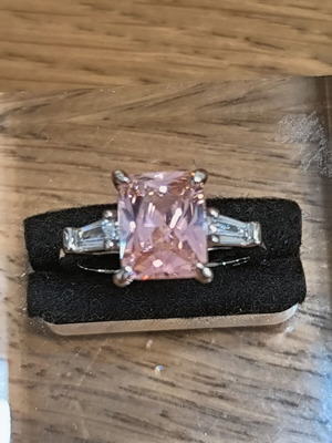 Ring with pink rectangular zircon and silver plating
