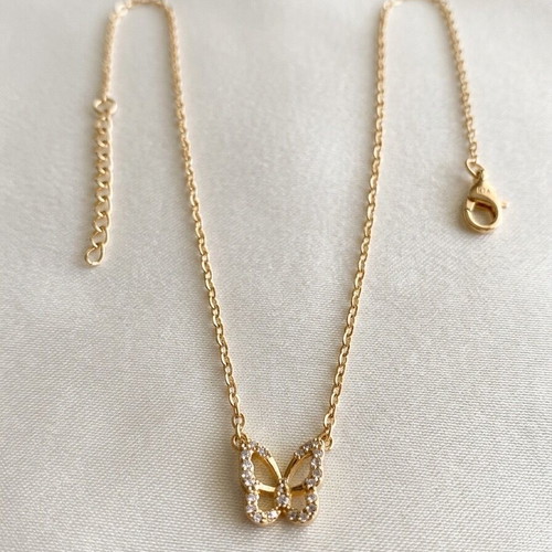 Gold necklace with butterfly design and zircon like new