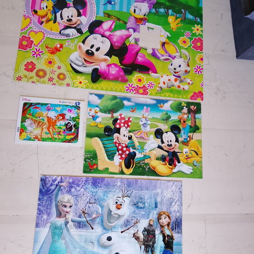 Disney puzzles pack of 4 used with Minnie, Mickey Mouse, Frozen