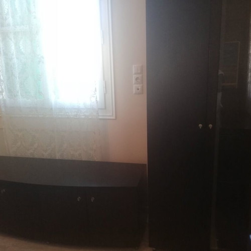 Wooden living room unit like new with glass cabinet and lighting