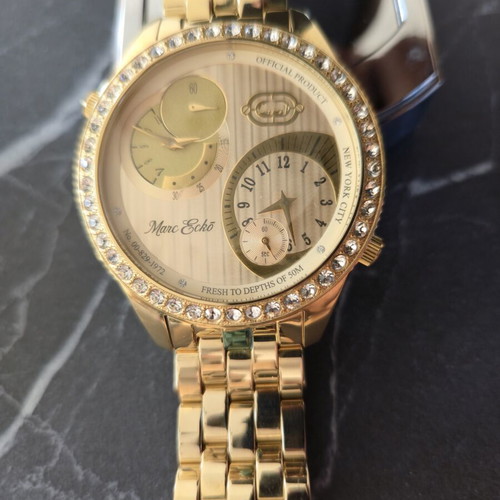 Marc Ecko gold-tone wristwatch with crystal bezel