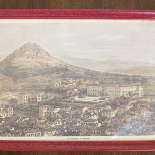 Frames with old photographic views of the Acropolis and the Palaces like new