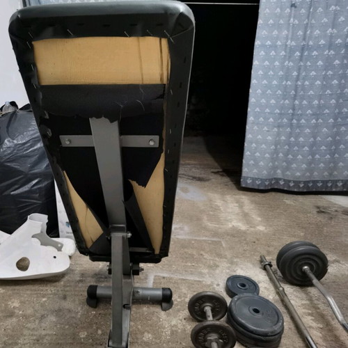 Gym equipment and weights used, set with Amila bench