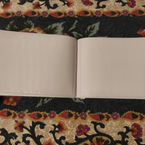 Photo album pocket size like new, holds 36 photos 10x15