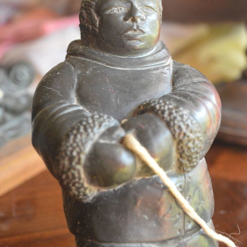 Three Inuit figurines used, indigenous Eskimo creations from Canada