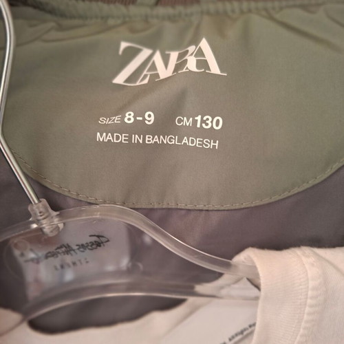 Package with 1 Zara vest 8-9 years, 1 new Orchestra shorts and 1 free t-shirt