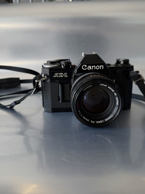 Canon AE-1 αναλογική φωτογραφική μηχανή με φακό FD 50mm f/1.4 S.S.C. σαν καινούργιο