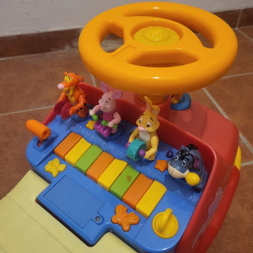 Winnie the Pooh ride-on car with sounds and storage