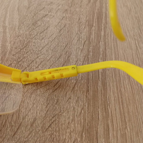 Hilka safety glasses used with adjustment and cord holes