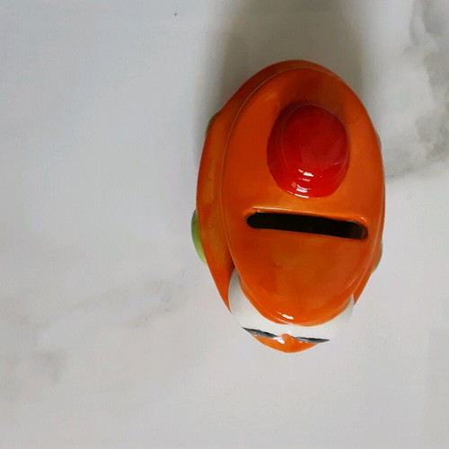 Small boat-shaped piggy bank like new