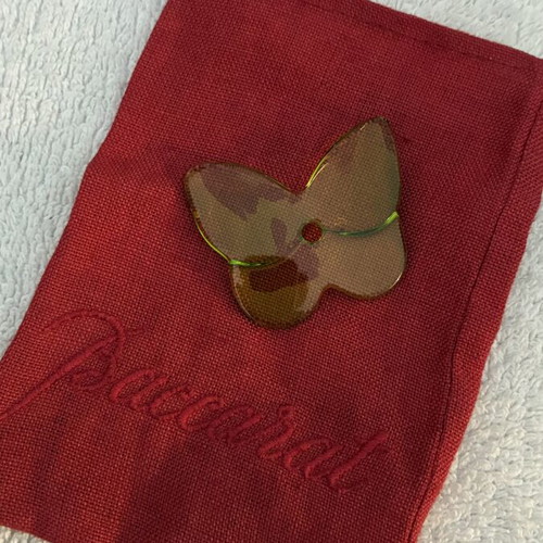 Baccarat butterfly crystal pendant with black cord