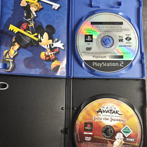 PlayStation 2 Slim console bundle with 2 games