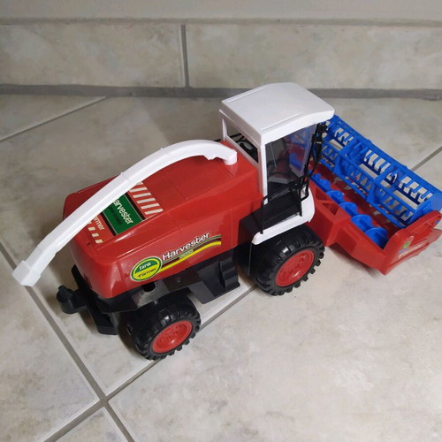 Harvester toy used with trailer