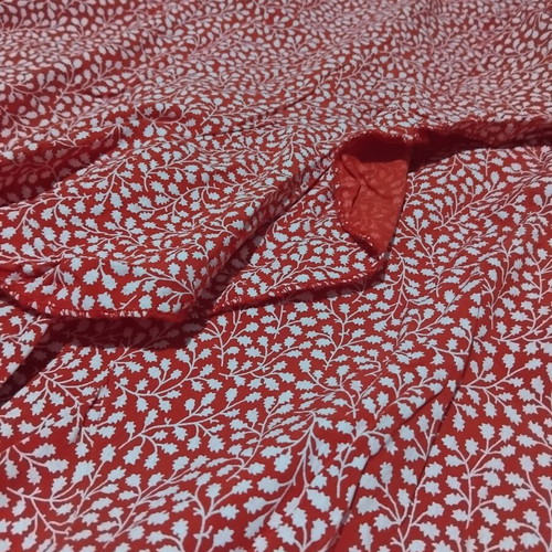 Midi asymmetrical skirt like new, red with small floral print, size M