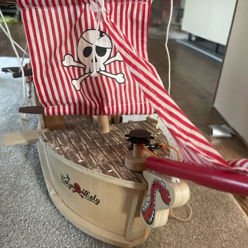 Wooden pirate ship used with small break and marker stains