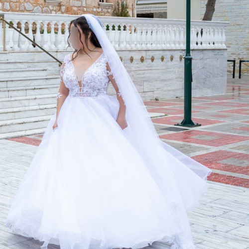 Wedding dress like new with hoop skirt and veil, size L-XL from Atelier Marina Galani