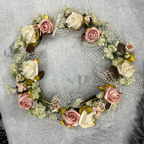 Decorative wreath used made of roses