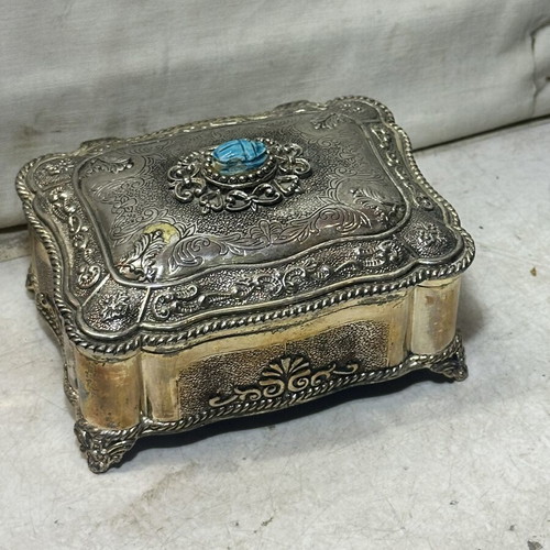 Vintage metal jewelry box with blue scarab, used