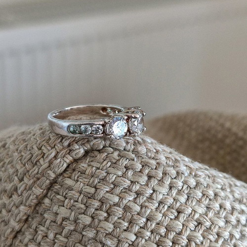 Trilogy silver plated ring used with zircon and heart motifs