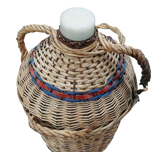 Large vintage glass demijohn with wicker cover, 30 liters, used