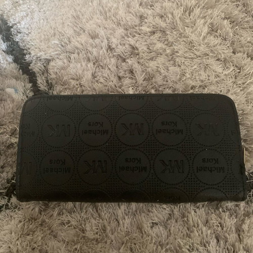 Michael Kors women's wallet black like new with broken zipper