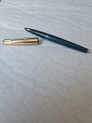 Parker 61 fountain pen with blue body and goldfilled cap