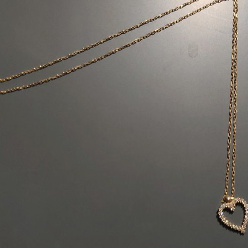 Heart necklace with white rhinestones new with thin chain