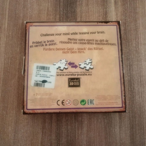 Metal puzzle set of 10 purple pieces like new, for kids 7+