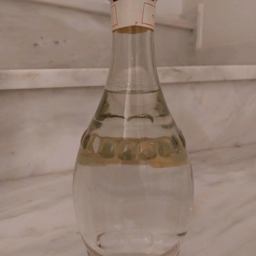 Ouzo Sans Rival 1lt new in round bottle, sealed, collectible