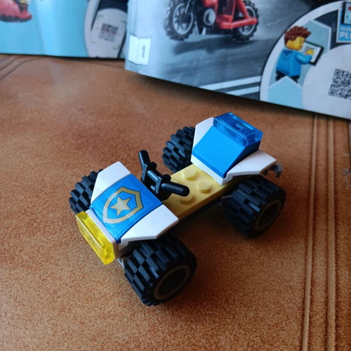 Lego set used with truck, helicopter, and motorcycle