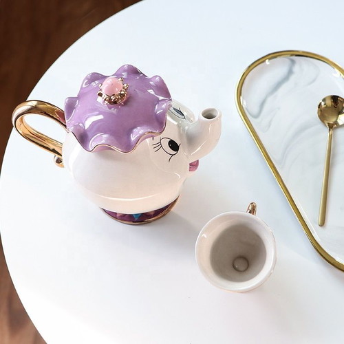 Beauty and the Beast set with Mrs. Potts teapot and Chip cup new