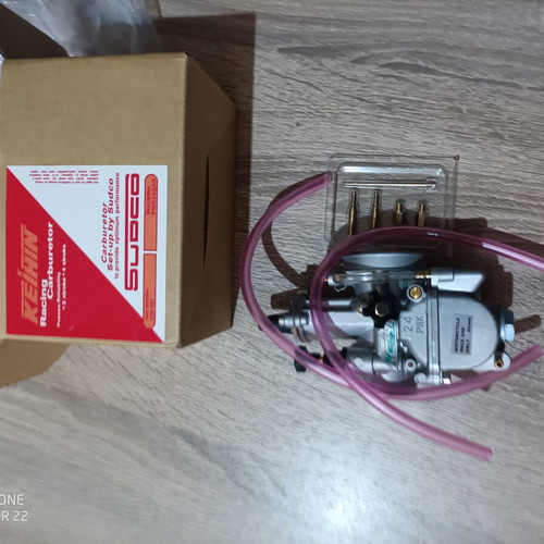 Carburetor 24mm new with extra needle, jet, neck, screws, and rubber mouth