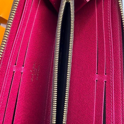 Louis Vuitton Clémence wallet used, monogram canvas with pink zipper