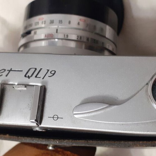 Canon Canonet QL19 camera used with flash and extra lens