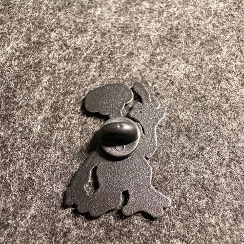 E.T. enamel pin brand new, black and beige