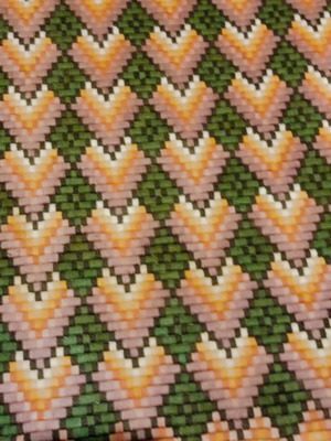 Hand embroidered rug used, over 70 years old